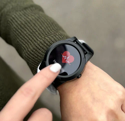 Medical alert smartwatch showing the heart-rate monitor securely worn on the wrist