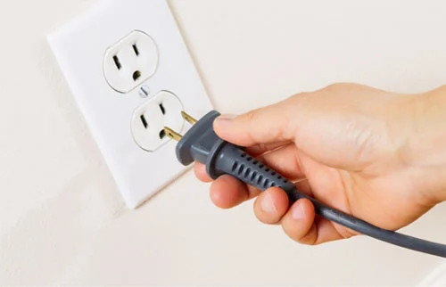 Power cord for at-home landline medical alert device